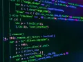 Código fuente en pantalla, con texto verde y azul sobre fondo negro. Se ve una función para eliminar filtros, parte de un proyecto daw online.