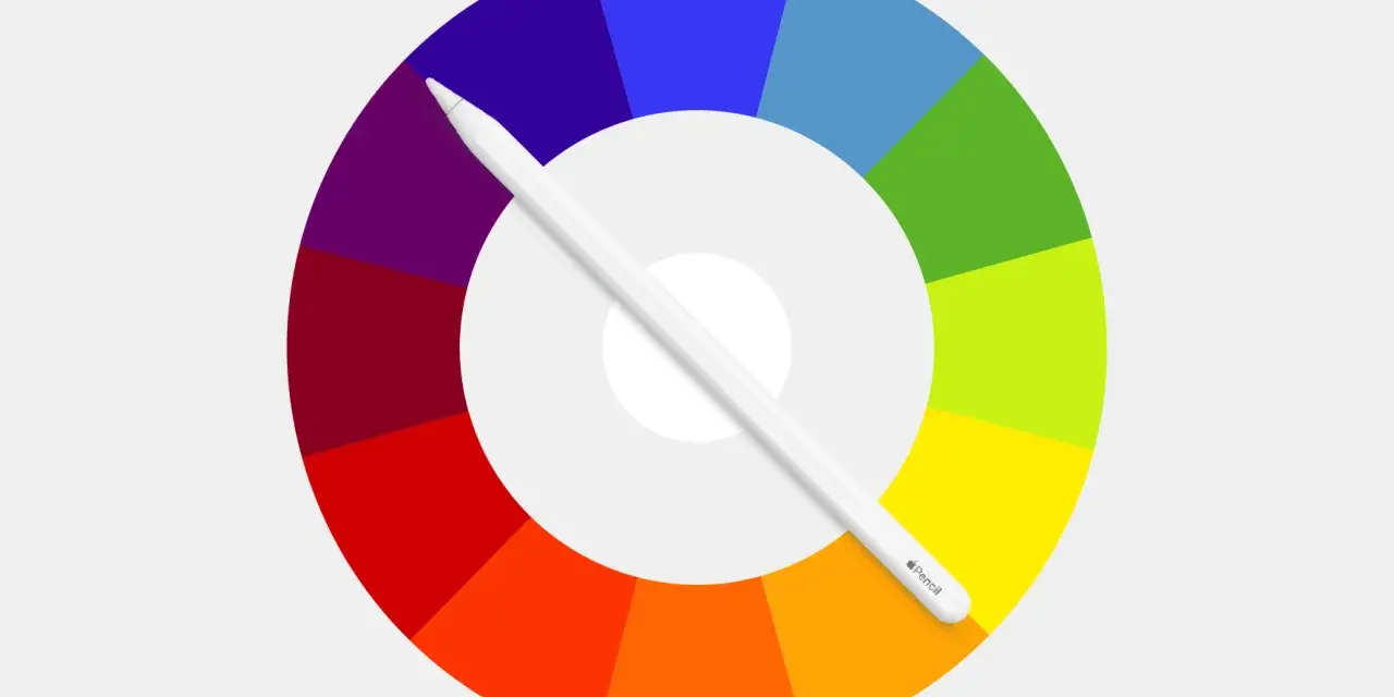 Rueda de colores con tonos ordenados por tonos, cruzada por un lápiz digital blanco.