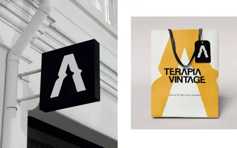 Letrero negro con logo "A" y bolsa de compras "TERAPIA VINTAGE". Salidas de diseño gráfico.