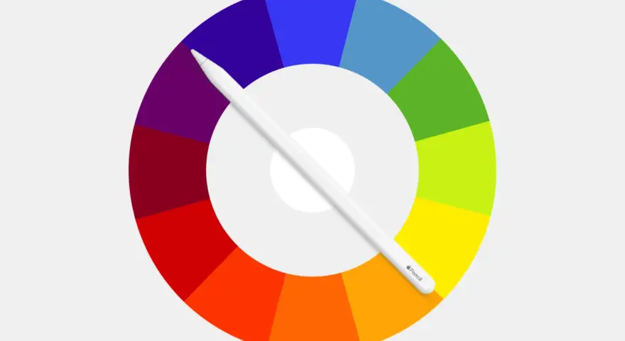 Rueda de colores con tonos ordenados por tonos, cruzada por un lápiz digital blanco.